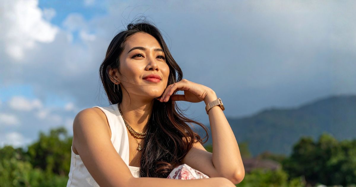 An asian woman relaxing after getting IV vitamin infusions in Bergen County, NJ